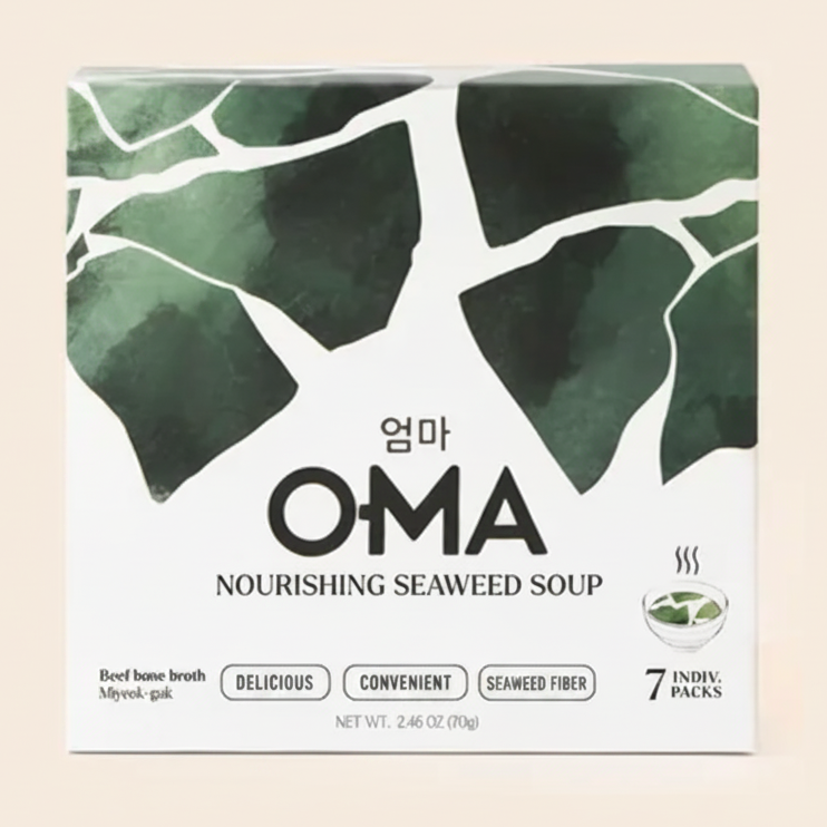 Box of OMA nourishing seaweed soup with green leaf design on a beige background